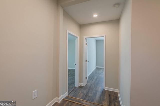 3107 Hendrix Cir SW, Covington, GA 30014 - hallway with dark wood finished floors, baseboards, and recessed lighting