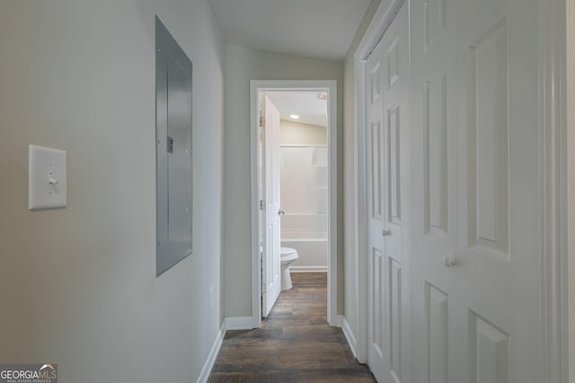 3107 Hendrix Cir SW, Covington, GA 30014 - hallway featuring electric panel, baseboards, and dark wood-style floors