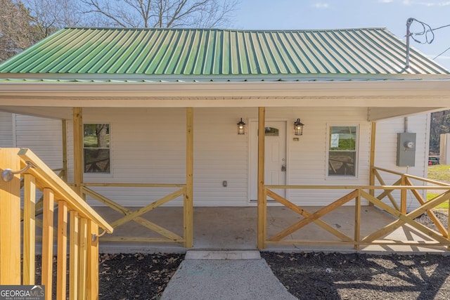 3107 Hendrix Cir SW, Covington, GA 30014 - entrance to property featuring metal roof