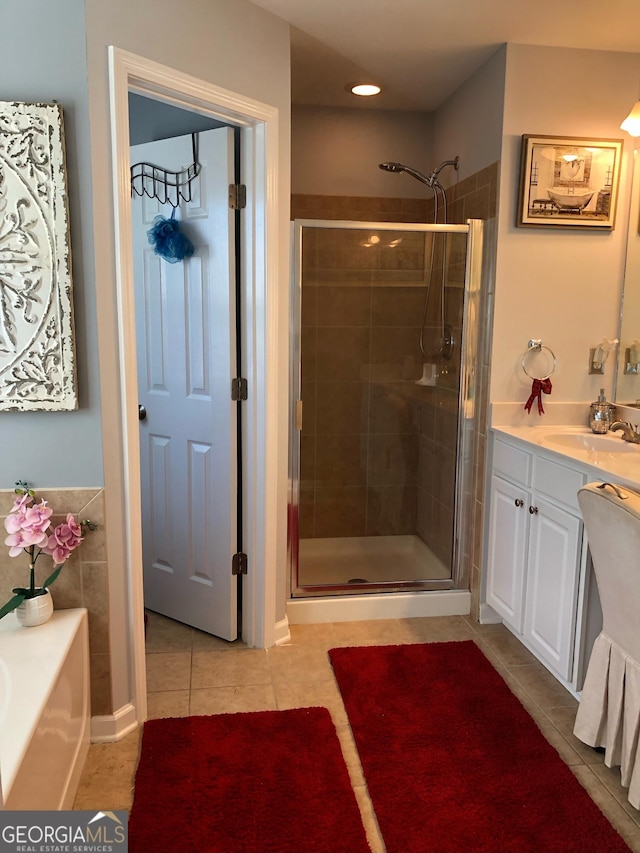 3692 Ramsey Cir, Atlanta, GA 30331 - full bath with tile patterned flooring, a shower stall, vanity, and a bath