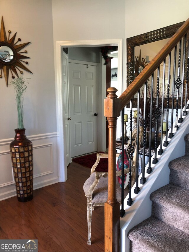 3692 Ramsey Cir, Atlanta, GA 30331 - entryway with wood finished floors, stairs, and wainscoting