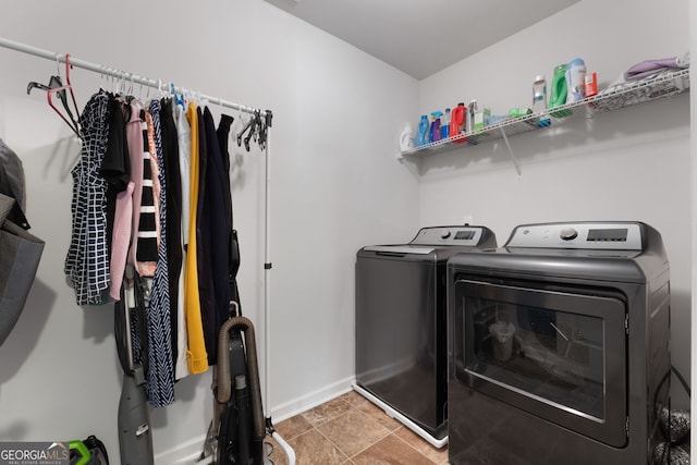 1412 Short Ct, Mcdonough, GA 30252 - washroom with washing machine and dryer and baseboards