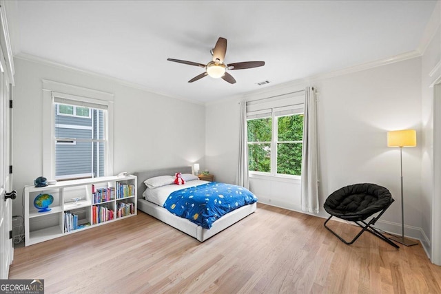 4048 Navajo Trl NE, Brookhaven, GA 30319 - bedroom with wood finished floors, ornamental molding, a ceiling fan, and baseboards