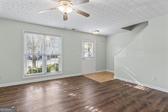 11439 S Grove Dr, Hampton, GA 30228 - empty room with wood finished floors, baseboards, and ceiling fan