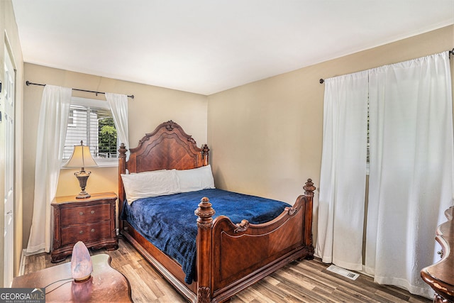 992 Brian Ln, Forest Park, GA 30297 - bedroom with wood finished floors and baseboards