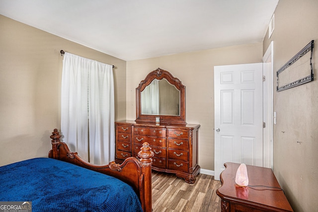 992 Brian Ln, Forest Park, GA 30297 - bedroom with wood finished floors