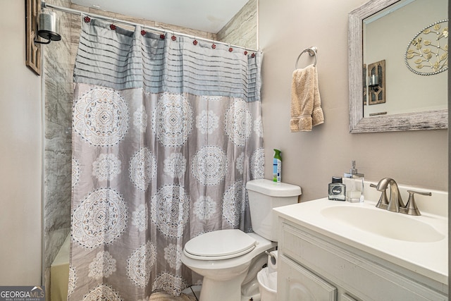 992 Brian Ln, Forest Park, GA 30297 - bathroom featuring toilet, vanity, and shower / bathtub combination with curtain