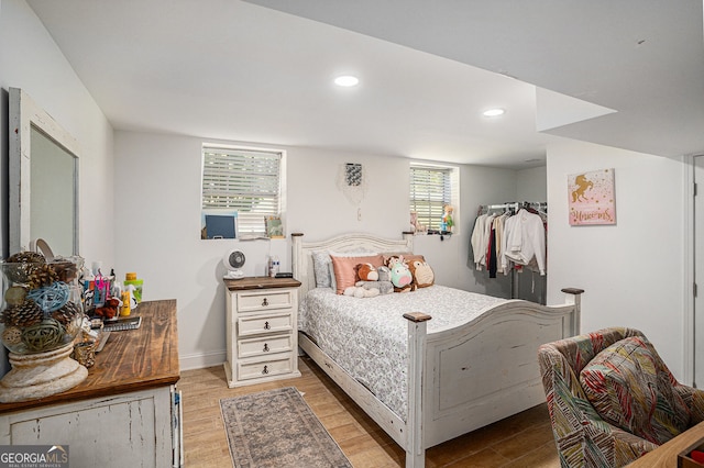 992 Brian Ln, Forest Park, GA 30297 - bedroom featuring wood finished floors, recessed lighting, and baseboards