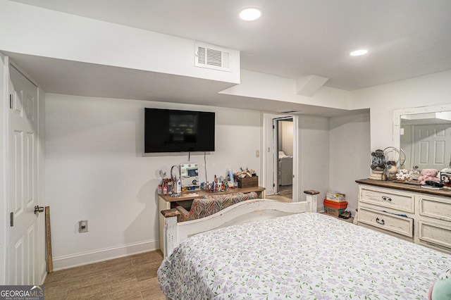 992 Brian Ln, Forest Park, GA 30297 - bedroom with baseboards, light wood-style floors, and recessed lighting
