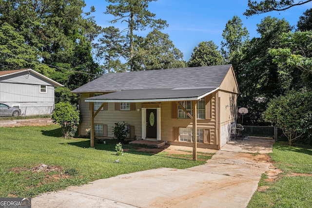 992 Brian Ln, Forest Park, GA 30297 - bi-level home with concrete driveway and a shingled roof