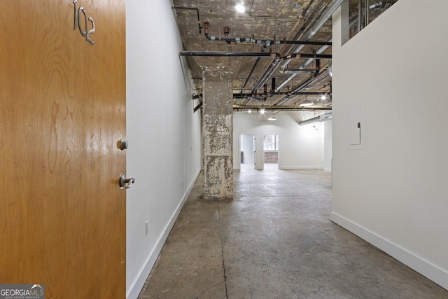 505 Whitehall St SW Unit 102, Atlanta, GA 30303 - hall with baseboards and concrete floors