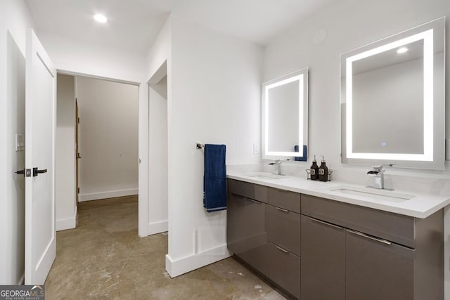 505 Whitehall St SW Unit 102, Atlanta, GA 30303 - full bath with concrete floors, double vanity, and baseboards