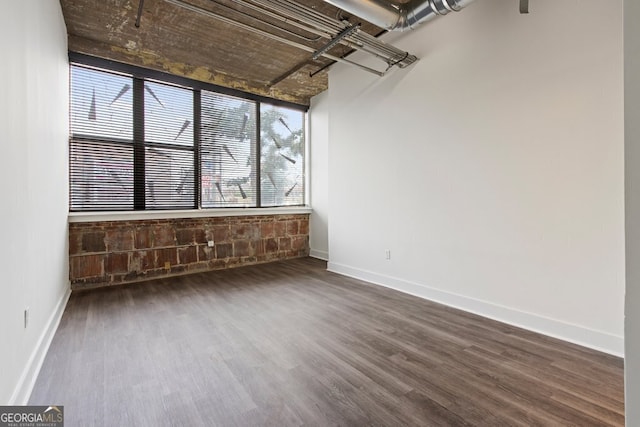 505 Whitehall St SW Unit 102, Atlanta, GA 30303 - spare room with wood finished floors and baseboards