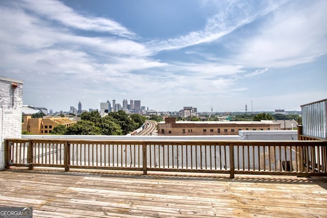 505 Whitehall St SW Unit 102, Atlanta, GA 30303 - wooden deck featuring a view of skyline