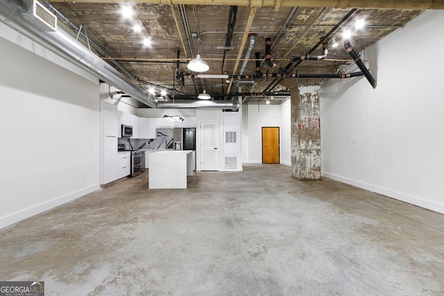 505 Whitehall St SW Unit 102, Atlanta, GA 30303 - below grade area with baseboards and a garage