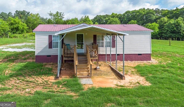 3350 Waggoners Grove Church Rd, Colbert, GA 30628 - manufactured / mobile home featuring crawl space, a front yard, and metal roof