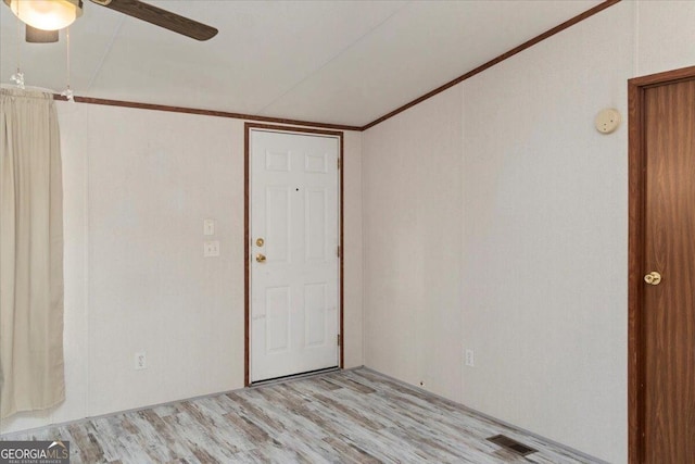 3350 Waggoners Grove Church Rd, Colbert, GA 30628 - empty room featuring a ceiling fan, light wood-type flooring, a smoke detector, and ornamental molding