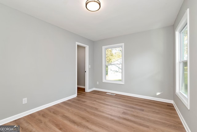 124 Stark St, Commerce, GA 30529 - empty room featuring light wood finished floors and baseboards