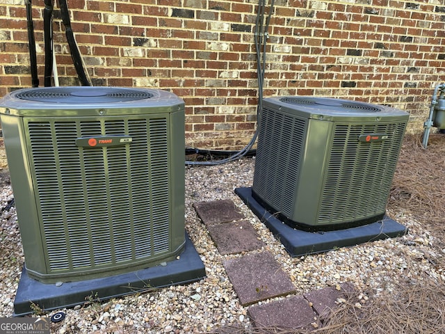 245 River Laurel Way, Woodstock, GA 30188 - exterior view of cooling unit, brick siding, and gas meter