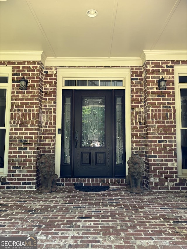 245 River Laurel Way, Woodstock, GA 30188 - property entrance featuring brick siding and a porch