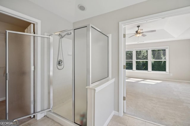 7025 Coffield Ct, Cumming, GA 30041 - bathroom with a ceiling fan, a shower stall, tile patterned flooring, and baseboards