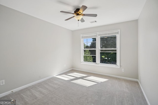 7025 Coffield Ct, Cumming, GA 30041 - carpeted empty room with baseboards and ceiling fan