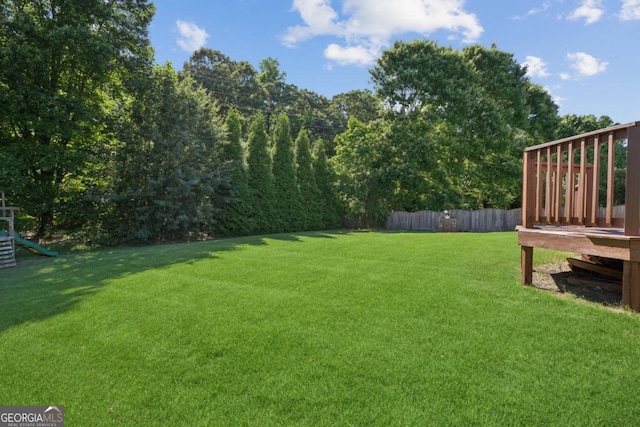 7025 Coffield Ct, Cumming, GA 30041 - view of yard featuring a wooden deck
