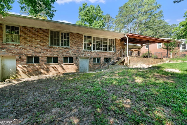 2933 King Alfred Dr, Macon, GA 31204 - rear view of house with brick siding
