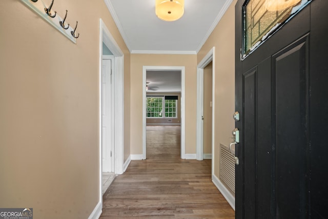 2933 King Alfred Dr, Macon, GA 31204 - foyer with light wood-type flooring, ornamental molding, and baseboards