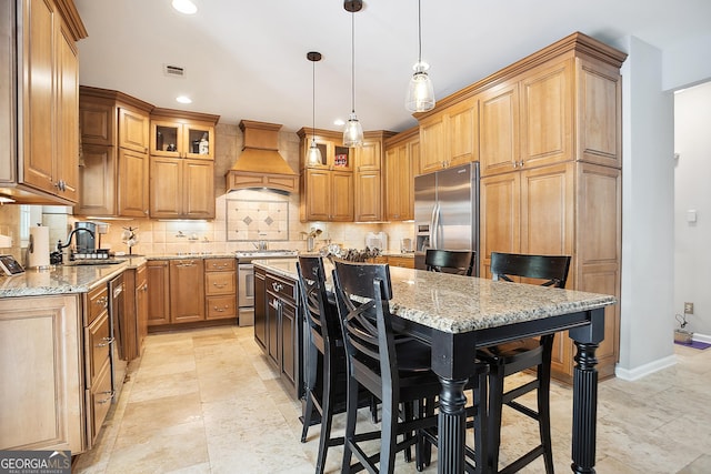 960 Pebblestone Ct, Alpharetta, GA 30009 - kitchen featuring premium range hood, stainless steel appliances, a sink, light stone counters, and recessed lighting