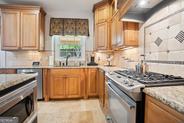960 Pebblestone Ct, Alpharetta, GA 30009 - kitchen with appliances with stainless steel finishes, a sink, decorative backsplash, light stone counters, and extractor fan