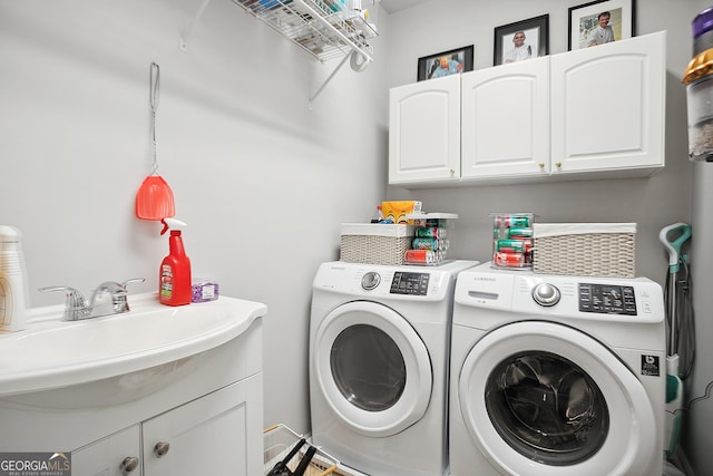 960 Pebblestone Ct, Alpharetta, GA 30009 - laundry room featuring washing machine and clothes dryer and cabinet space