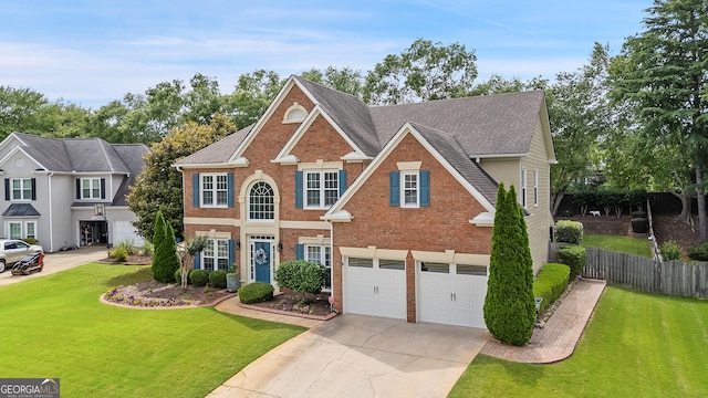 960 Pebblestone Ct, Alpharetta, GA 30009 - view of front of home featuring brick siding, a garage, driveway, and a shingled roof