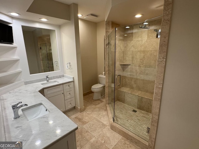 3047 Lenox Rd NE Unit 2105, Atlanta, GA 30324 - full bathroom with double vanity, toilet, a shower stall, recessed lighting, and baseboards