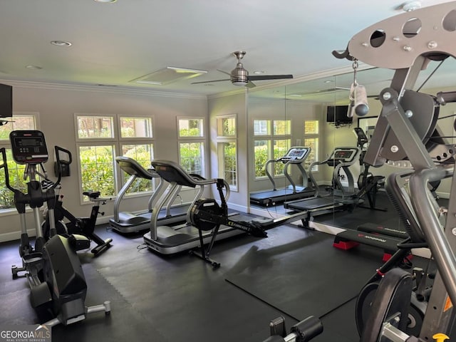3047 Lenox Rd NE Unit 2105, Atlanta, GA 30324 - workout area featuring healthy amount of natural light, ornamental molding, a ceiling fan, and baseboards