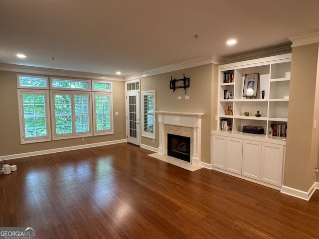 3047 Lenox Rd NE Unit 2105, Atlanta, GA 30324 - unfurnished living room featuring crown molding, a fireplace, dark wood-type flooring, baseboards, and recessed lighting