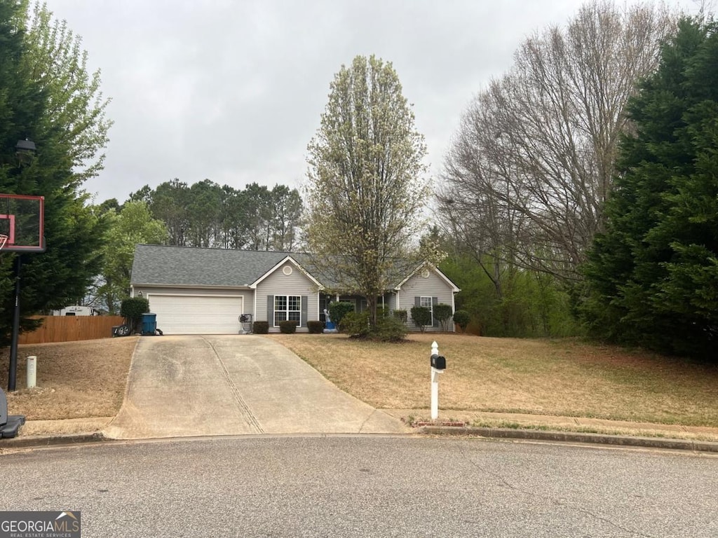 123 Chippewa Run, Auburn, GA 30011 - ranch-style home featuring a garage and concrete driveway