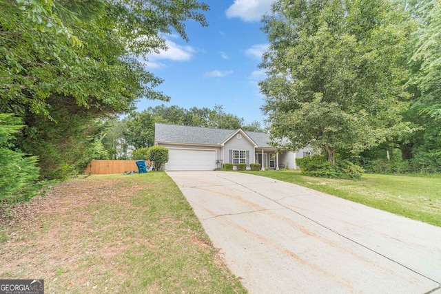 123 Chippewa Run, Auburn, GA 30011 - ranch-style house featuring a garage, concrete driveway, and a front yard