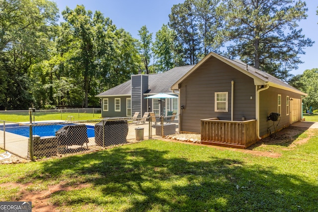102 Fern Way, Thomaston, GA 30286 - rear view of property with a chimney