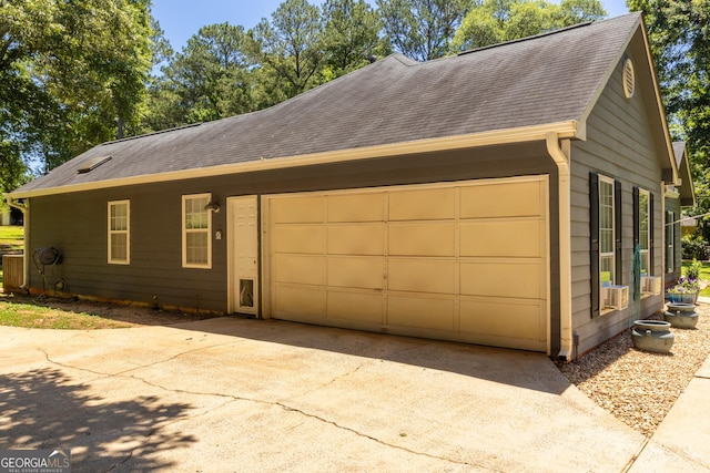 102 Fern Way, Thomaston, GA 30286 - view of front of house featuring roof with shingles, concrete driveway, and a garage
