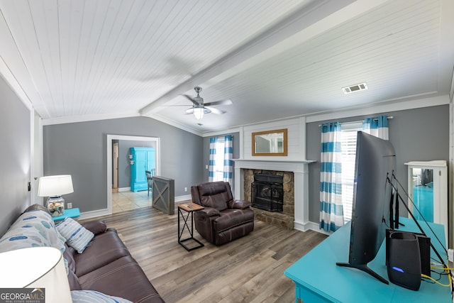 102 Fern Way, Thomaston, GA 30286 - living area featuring a ceiling fan, baseboards, wood finished floors, wood ceiling, and a stone fireplace
