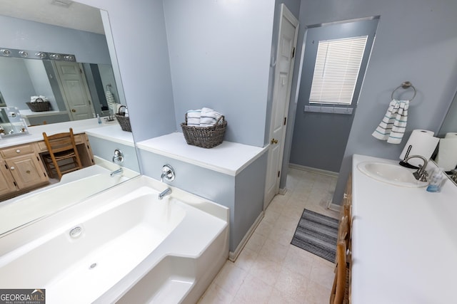 102 Fern Way, Thomaston, GA 30286 - bathroom featuring vanity, a bath, tile patterned flooring, and baseboards