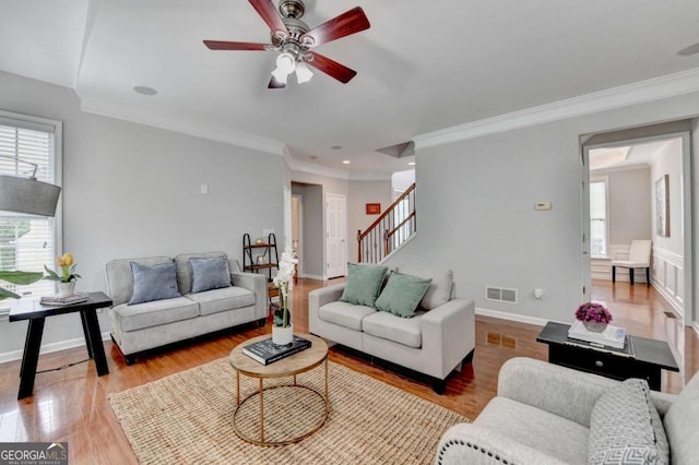 475 Bayswater Way, Suwanee, GA 30024 - living room with stairway, a ceiling fan, crown molding, wood finished floors, and recessed lighting