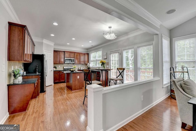 475 Bayswater Way, Suwanee, GA 30024 - kitchen with stainless steel appliances, dark countertops, light wood-type flooring, decorative backsplash, and recessed lighting