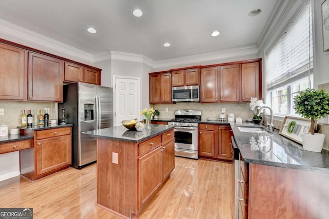 475 Bayswater Way, Suwanee, GA 30024 - kitchen featuring stainless steel appliances, a center island, light wood-style flooring, dark stone counters, and recessed lighting