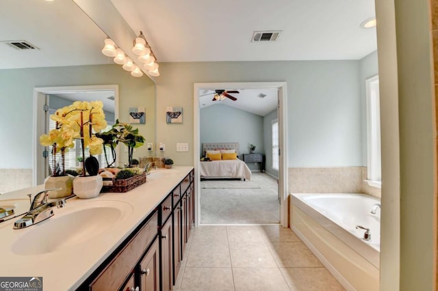 475 Bayswater Way, Suwanee, GA 30024 - ensuite bathroom featuring double vanity, ceiling fan, a bath, vaulted ceiling, and tile patterned flooring