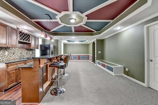 475 Bayswater Way, Suwanee, GA 30024 - carpeted home theater room featuring crown molding, coffered ceiling, and bar area