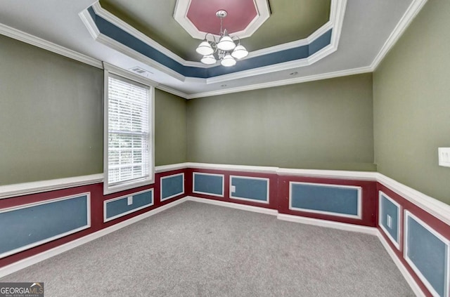 475 Bayswater Way, Suwanee, GA 30024 - carpeted empty room featuring crown molding, a chandelier, a raised ceiling, and wainscoting