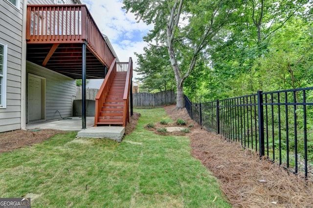 475 Bayswater Way, Suwanee, GA 30024 - fenced backyard featuring stairs, a deck, and a patio area