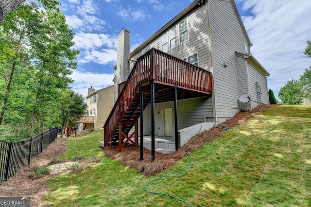 475 Bayswater Way, Suwanee, GA 30024 - back of property with stairs, a wooden deck, and a patio